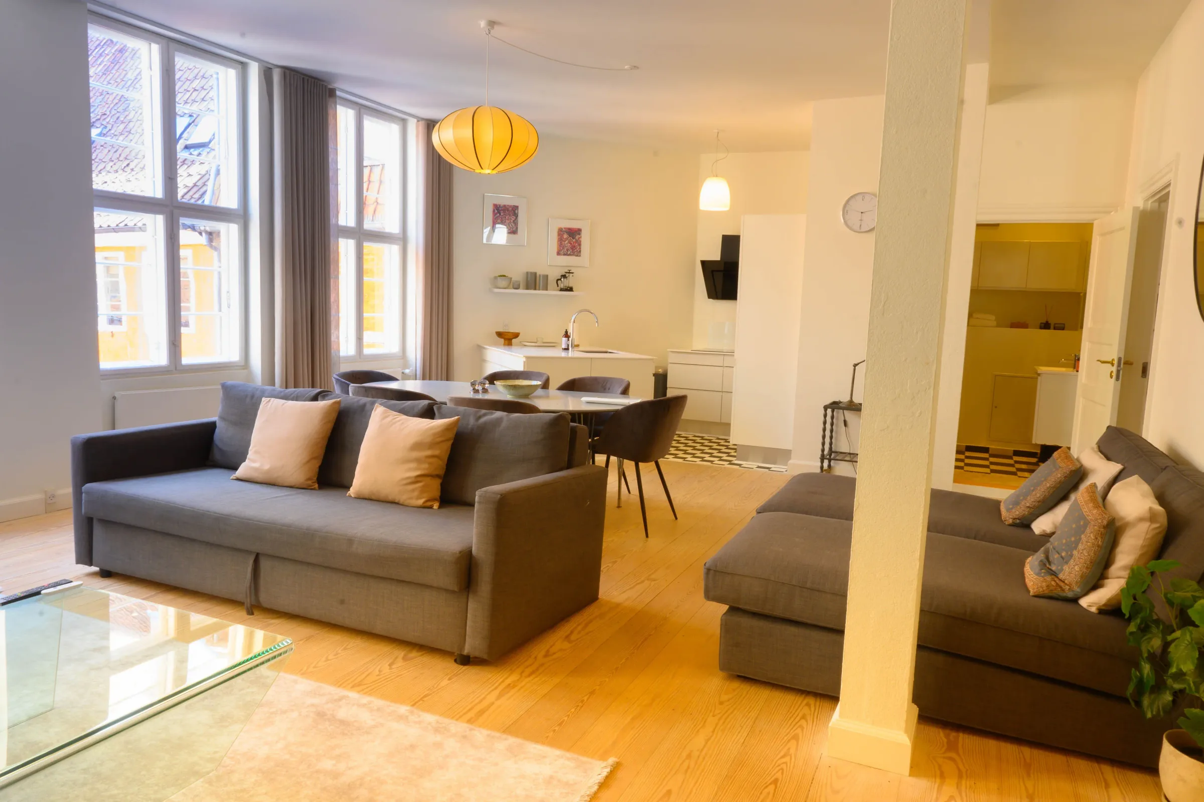 Open-plan living and dining room with Nordic furnishings — Stylish Nordic Apartment, central Copenhagen